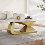 Table basse avec plateau en céramique et base contemporaine en acier inoxydable, une pièce maîtresse durable et élégante pour le salon.