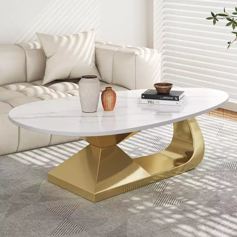 Table basse avec plateau en céramique et base contemporaine en acier inoxydable, une pièce maîtresse durable et élégante pour le salon.